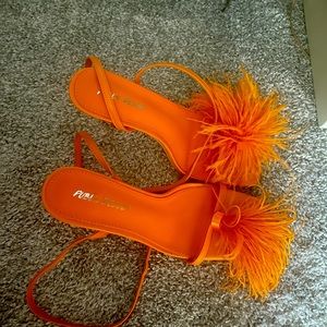 Orange feather heel